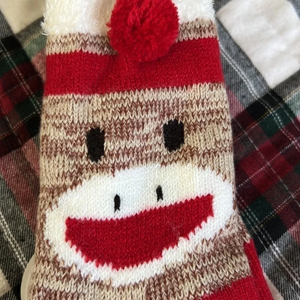 The sock monkey has rubber on the bottom for slip resistant.